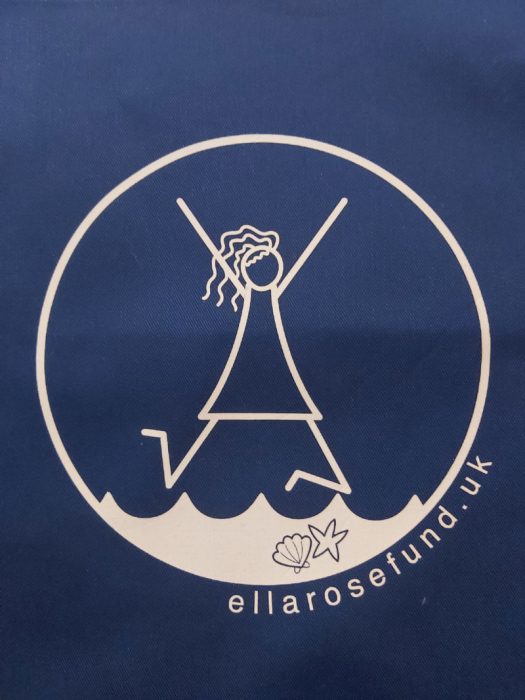 Navy apron, logo detail
